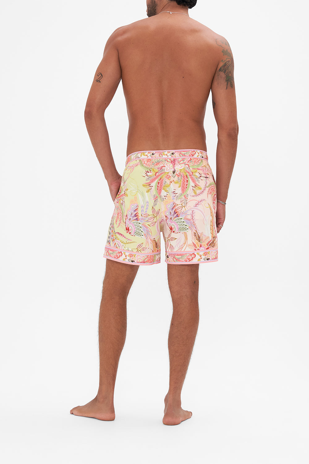 Back view of model wearing Hotel Franks by CAMILLA mens luxury boardshorts in Cosmic Tuscan print
