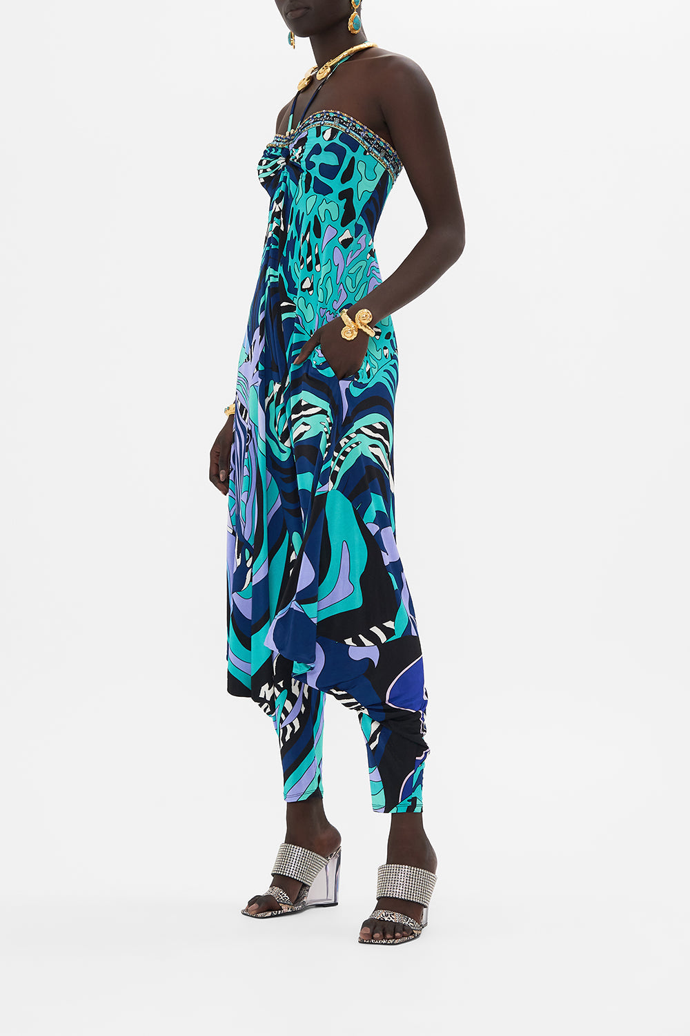 Side view of model wearing CAMILLA silk jumpsuit in Vividly Venice print