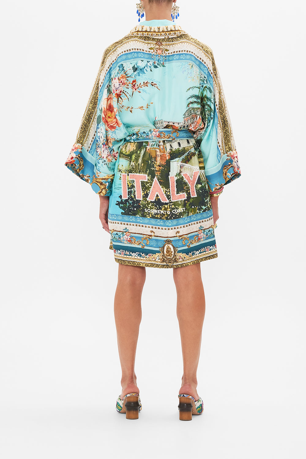 Back view of model wearing CAMILLA silk robe in from Sorrento With Love print