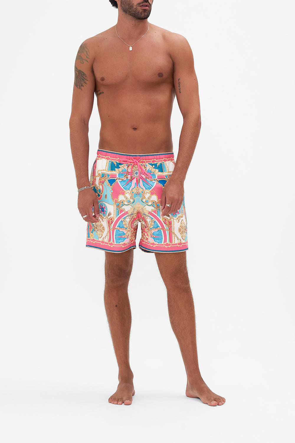 Front view of model wearing Hotel Franks by CAMILLA designer boardshorts in Sail Away With Me print 