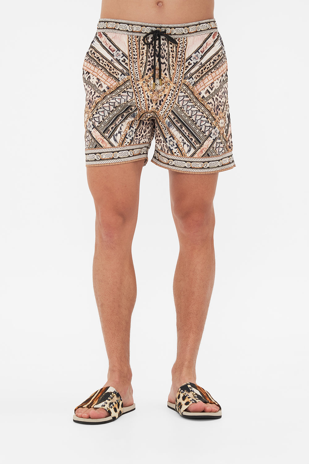 Crop view of model wearing Hotel Franks By CAMILLA mens boardshorts in mosaic muse print