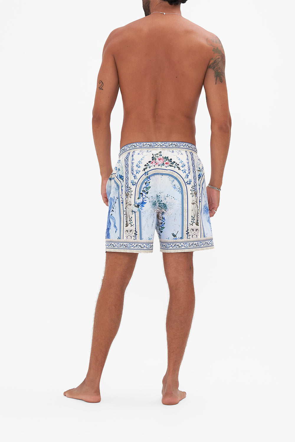 Back view of model wearing Hotel Franks by CAMILLA mens boardshort in Season Of The Siren print 