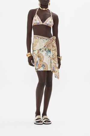 Crop view of model wearing CAMILLA resortwear sarong in Palazzo Playdate print