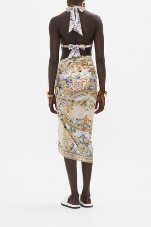 Back view of model wearing CAMILLA resortwear sarong in Palazzo Playdate print