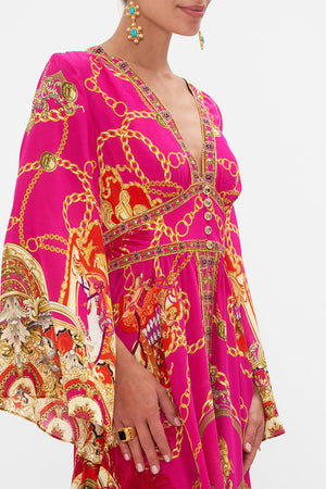 Crop view of model wearing CAMILLA pink silk maxi dress in Wild And Running  print 