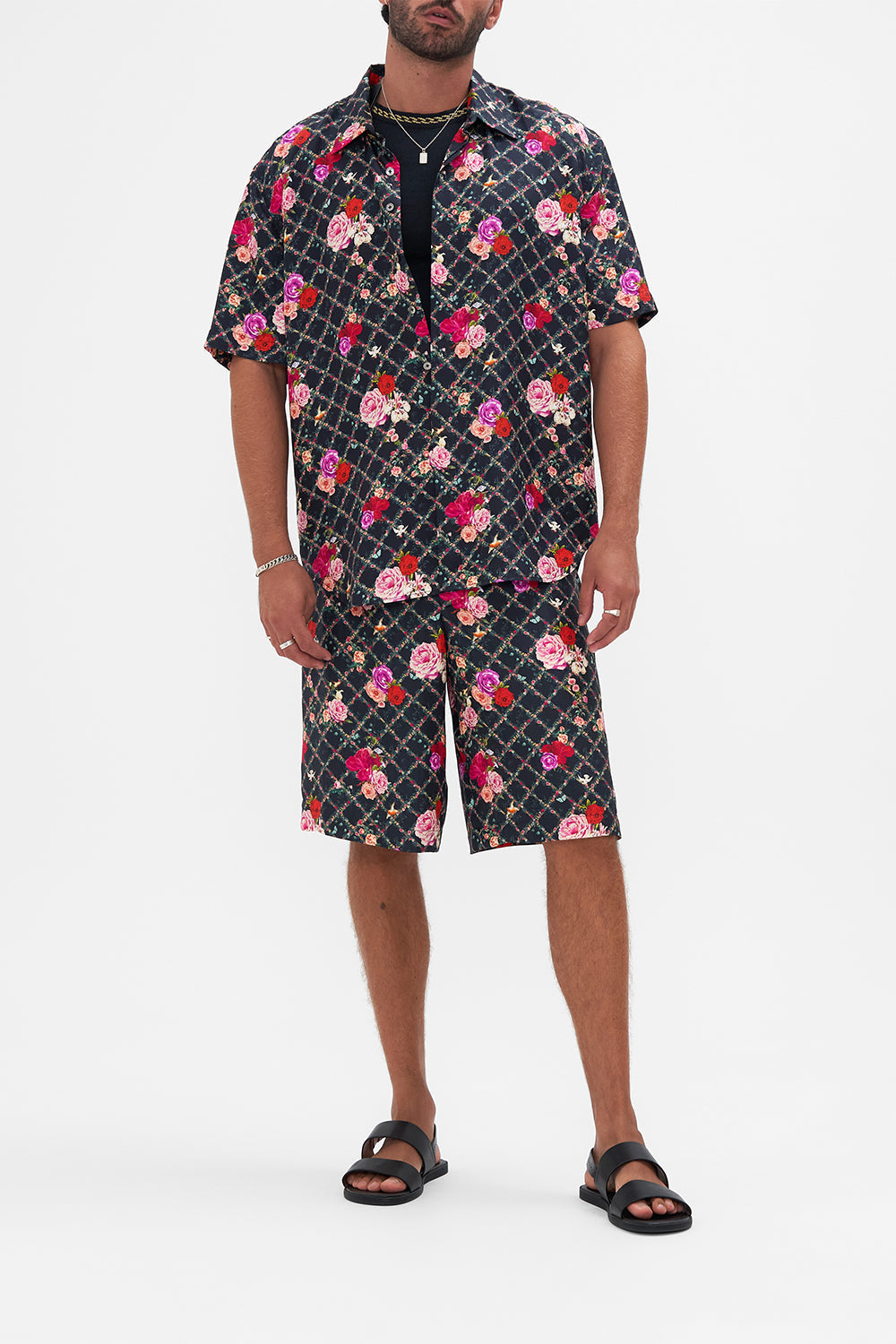 Front view of model wearing CAMILLA silk short sleeve shirt in Reservation For Love print 