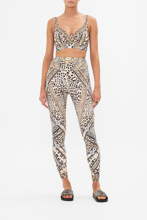 Front view of model wearing CAMILLA animal print leggings in Mosaic Muse