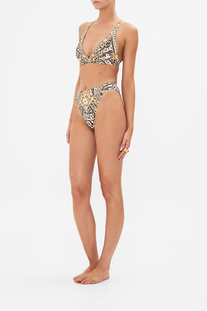 Side view of model wearing CAMILLA swim animal print bikini bottom in Mosaic Muse
