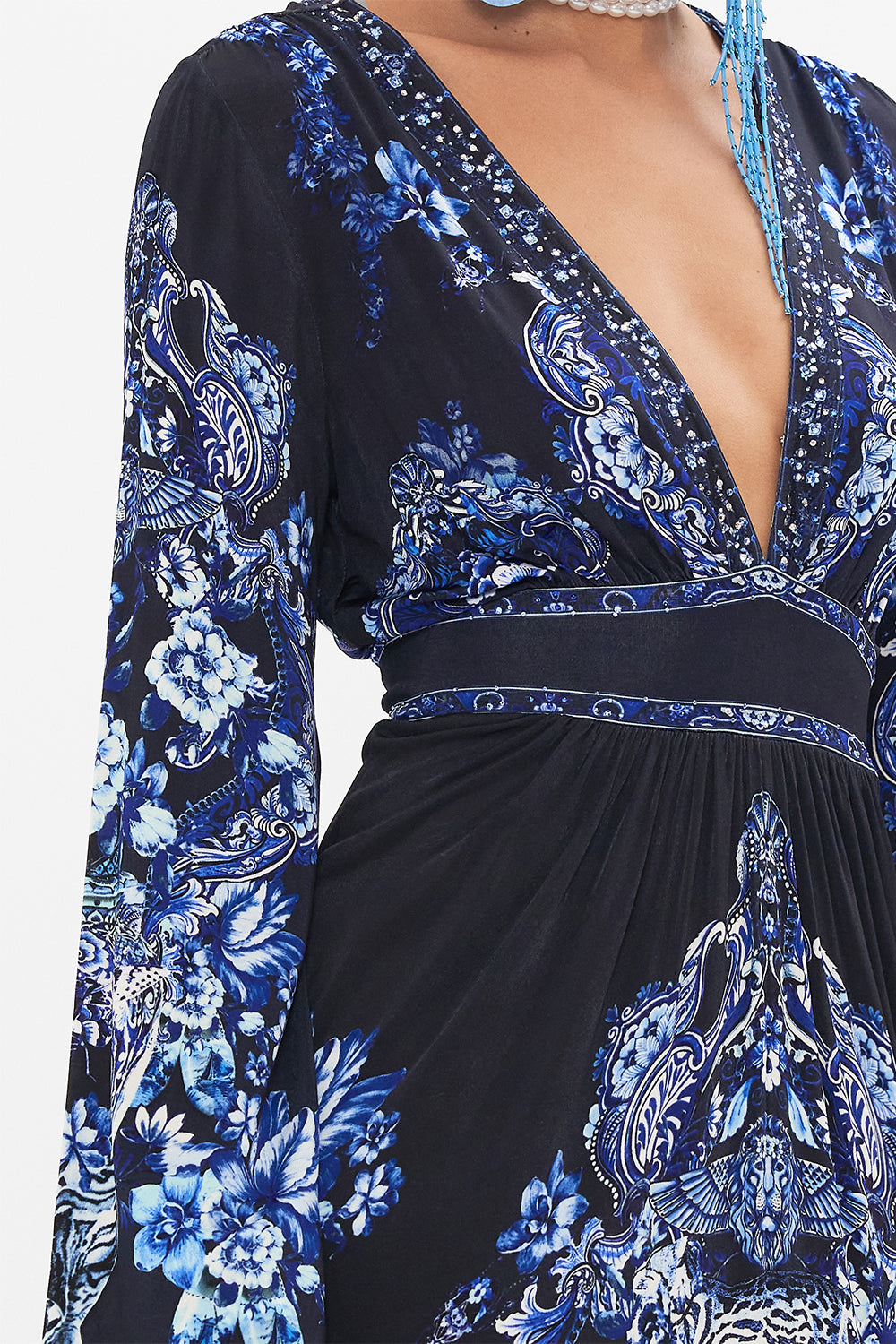 Side view of model wearing CAMILLA jersey dress in Delft Dynasty print 