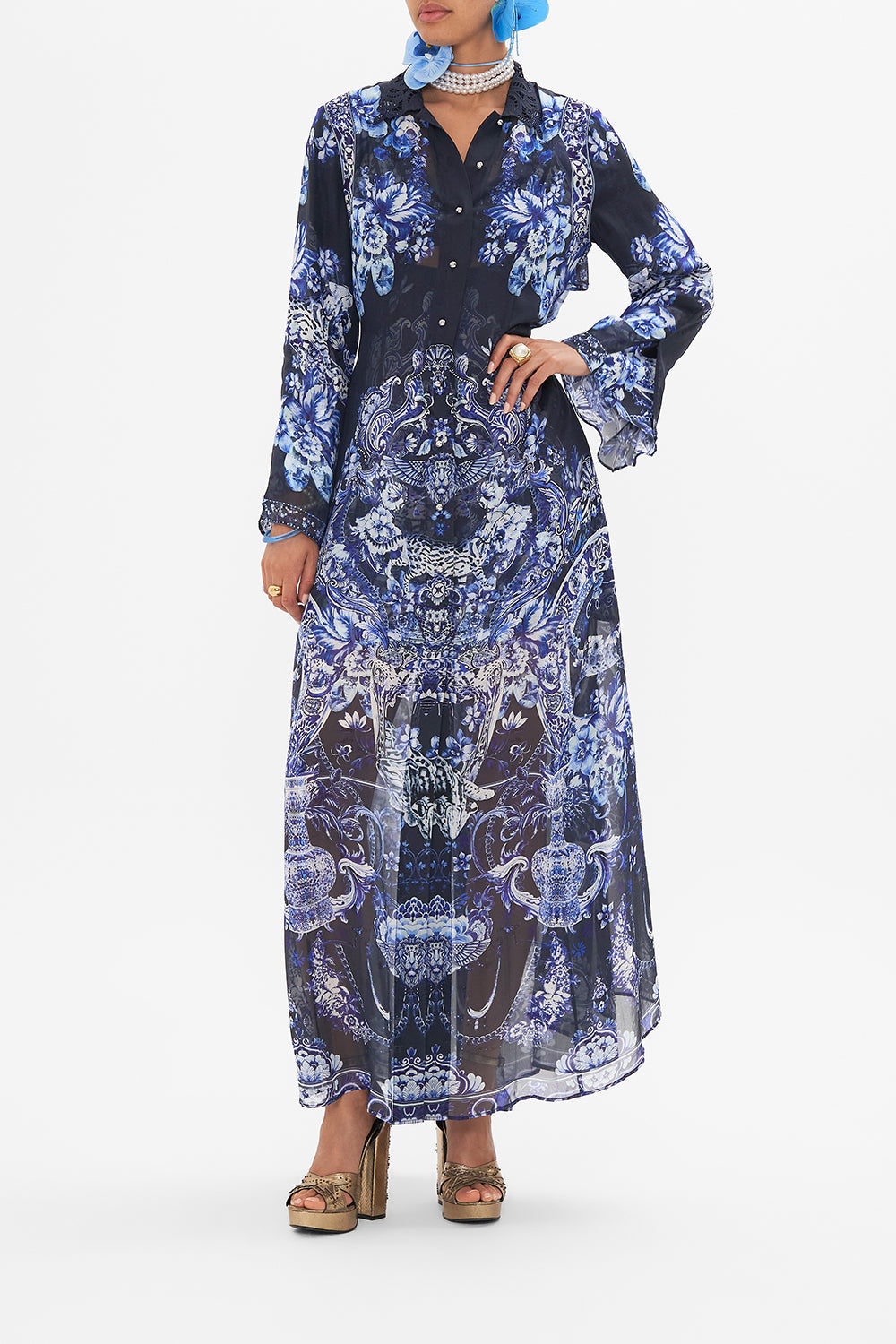 Front view of model wearing CAMILLA silk trench in Delft Dynasty print