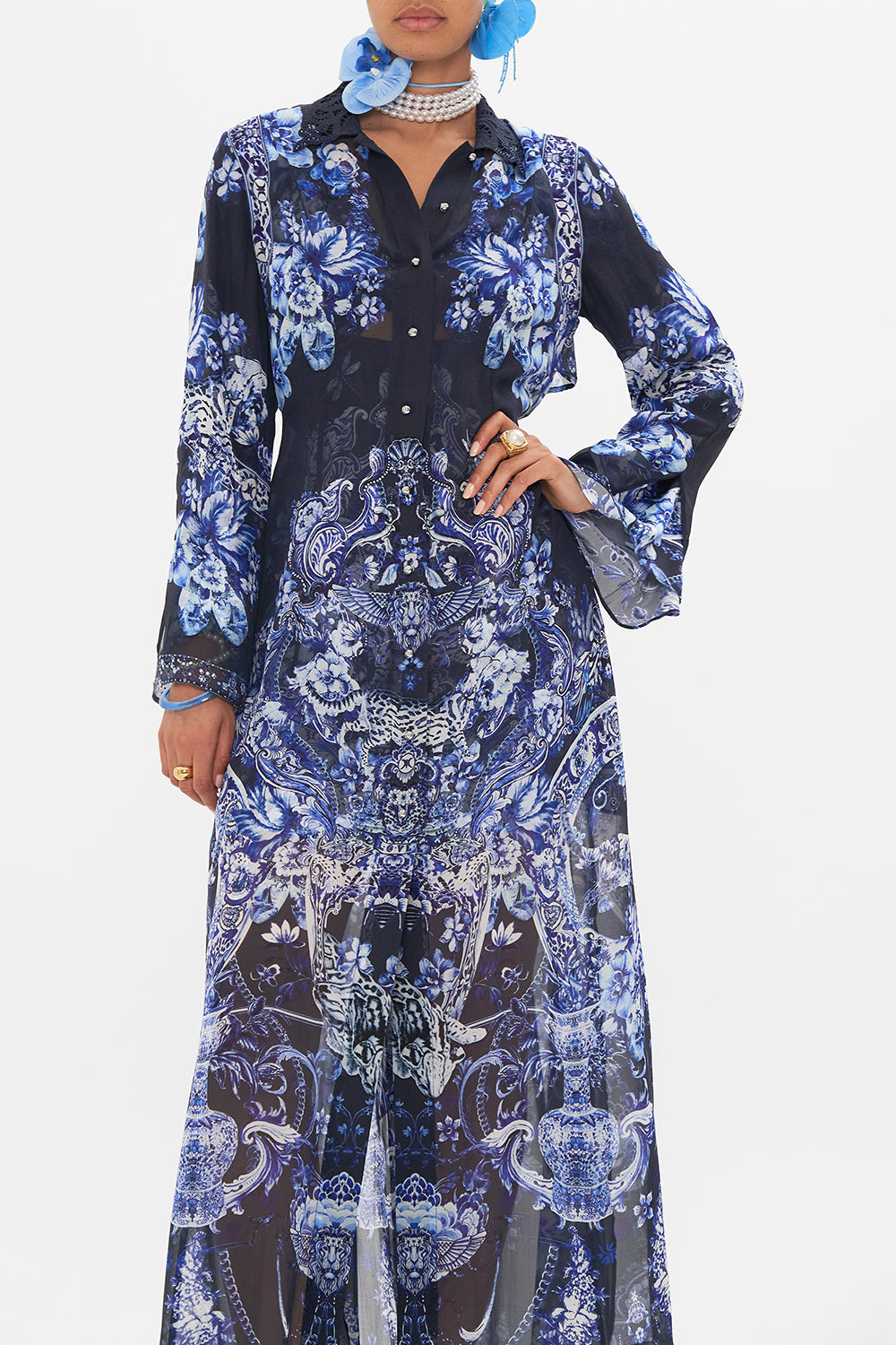 Side view of model wearing CAMILLA silk trench in Delft Dynasty print