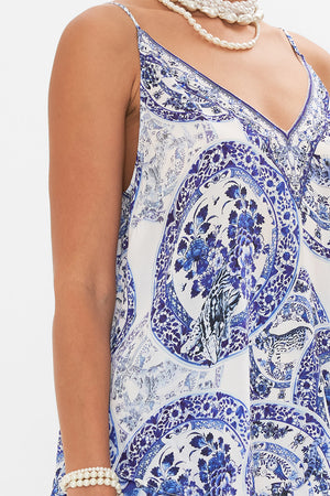 Detail view of model wearing CAMILLA silk cami top in Glaze and Graze print
