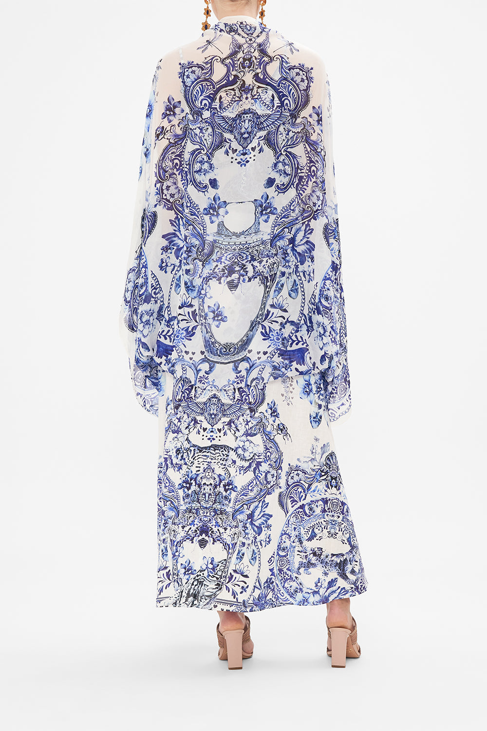 Back view of model wearing CAMILLA silk shrug in Glaze And Graze print