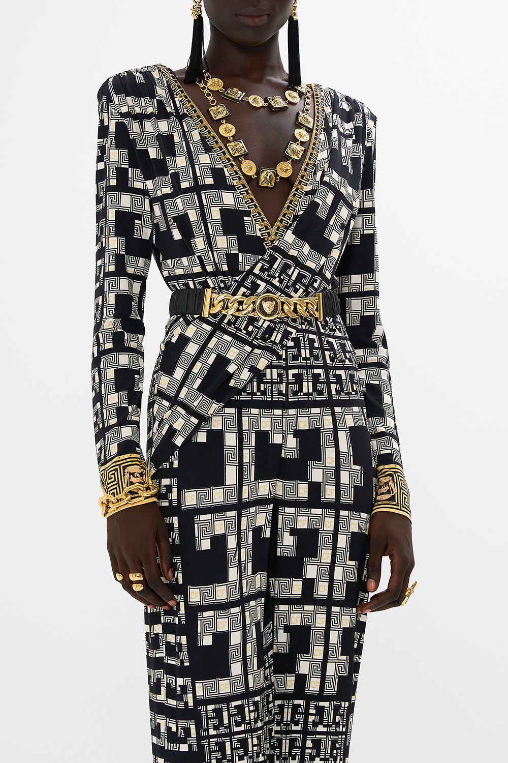 The CAMILLA LEOPARD BUTTON ELASTIC BELT SOLID BLACK in our  print.
