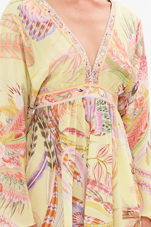 Details view of model wearing CAMILLA silk kimono mini dress in Cosmic Tuscan print 