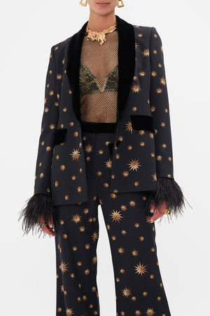 Crop view of model wearing CAMILLA silk jacket in Soul Of A Star Gazer print