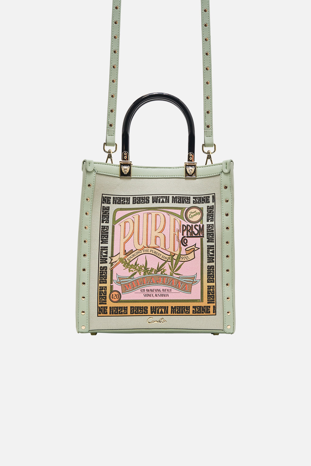 The CAMILLA NORTH SOUTH TOTE WITH SMOOTH HANDLE LETS CHASE RAINBOWS in our  print.