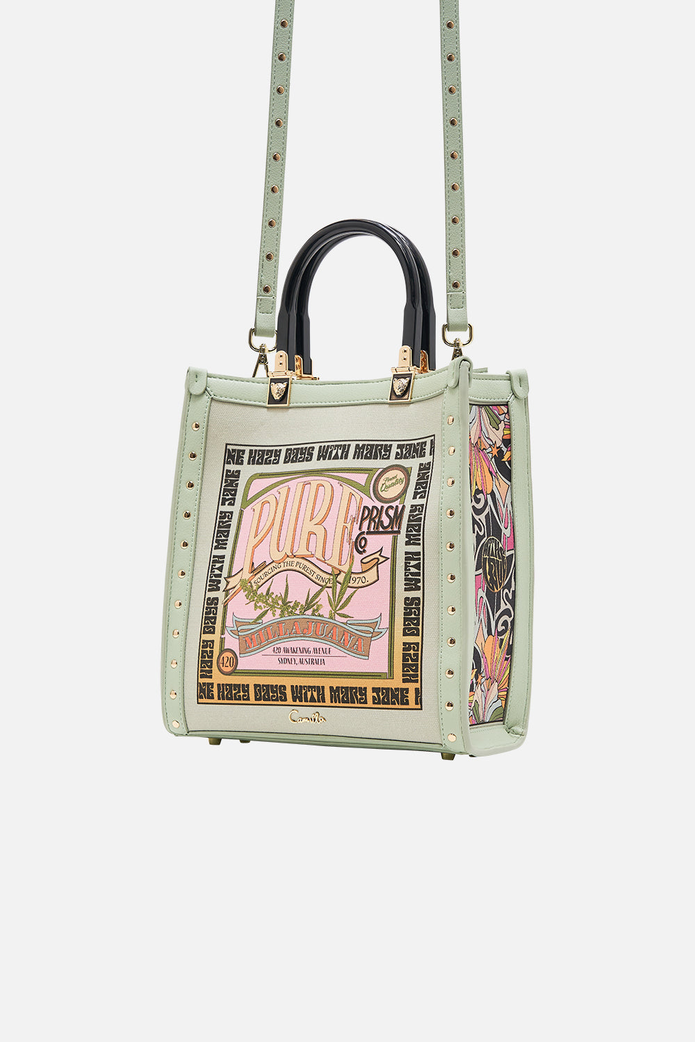 The CAMILLA NORTH SOUTH TOTE WITH SMOOTH HANDLE LETS CHASE RAINBOWS in our  print.