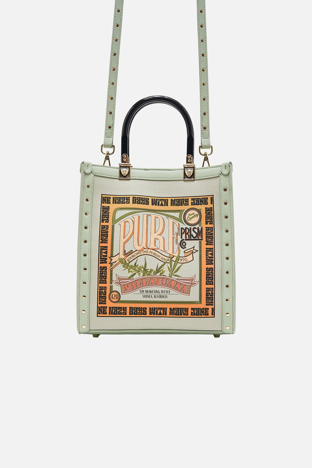 The CAMILLA NORTH SOUTH TOTE WITH SMOOTH HANDLE LETS CHASE RAINBOWS in our  print.