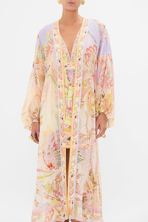 Detail view of model wearing CAMILLA silk kimono in Cosmic Tuscna print