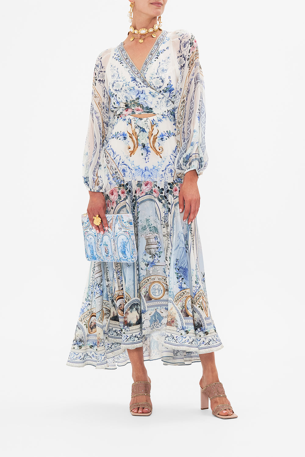 Front view of model wearing CAMILLA wrap dress in Seasson Of The Siren print 