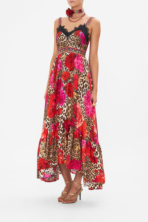 Side view of model wearing CAMILLA bodice dress in heart Like A Wildflower print