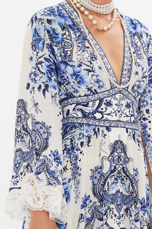Detail view of model wearing CAMILLA silk maxi dress in Glaze and Graze print