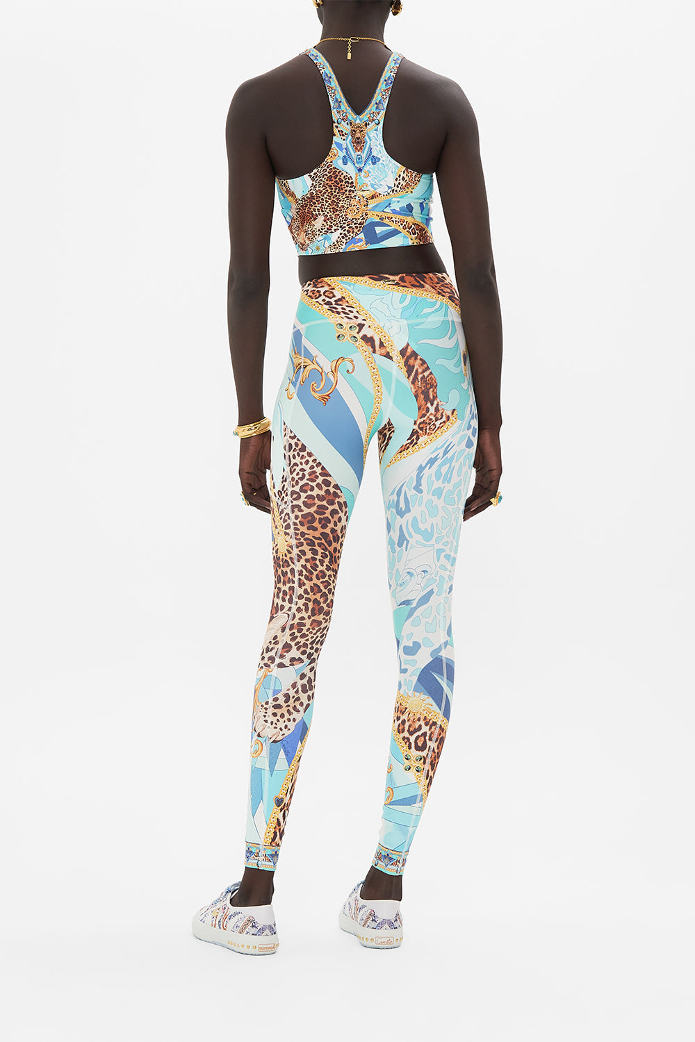 Back view of model wearing CAMILLA activewear legging in Sky Cheetah print