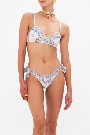 Crop view of model wearing CAMILLA lingerie bra in Season Of The Siren print
