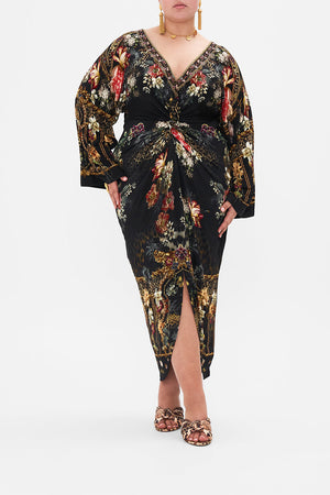 Front view of curvy model wearing CAMILLA plus size floral maxi dress in A Night At The Opera print