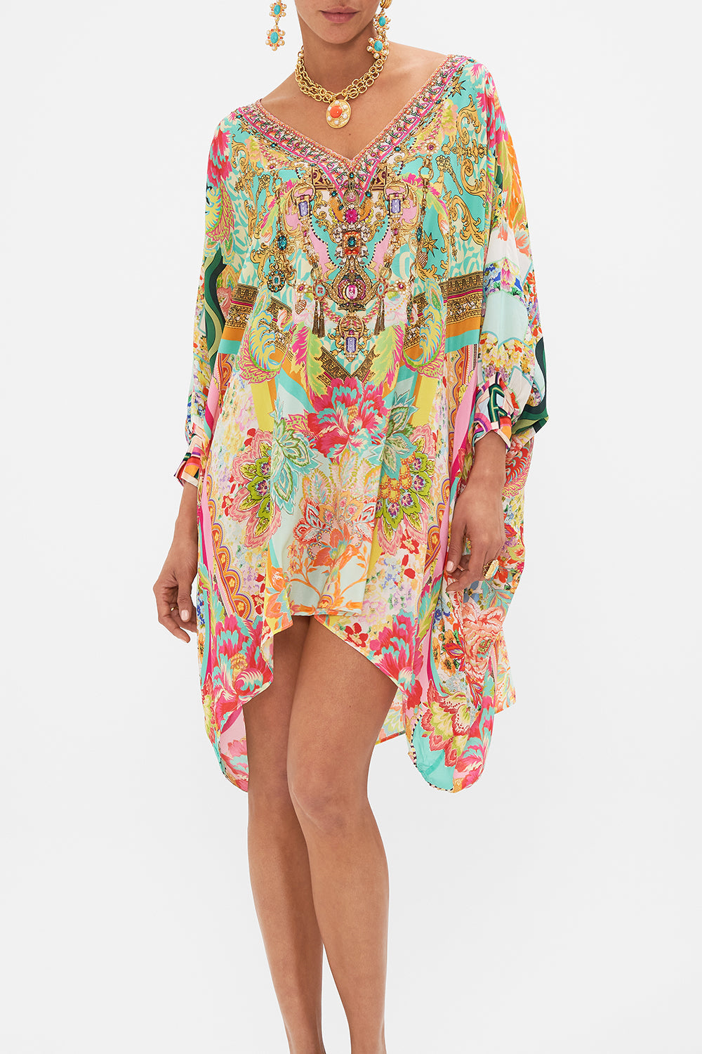 Crop view of model wearing CAMILLA short silk kaftan in An Italian Welcome print