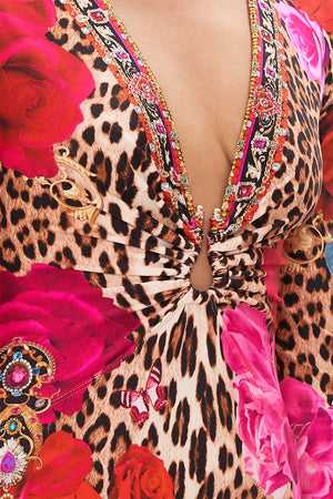 Detail view of model wearing CAMILLA catsuit in Heart Like A Wildflower print 