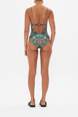 Back view of model wearing CAMILLA one piece swimsuit in Fan Dance print