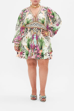Front view of curvy model wearing CAMILLA plus size  tropical print dress in Dear Amore Mio print 