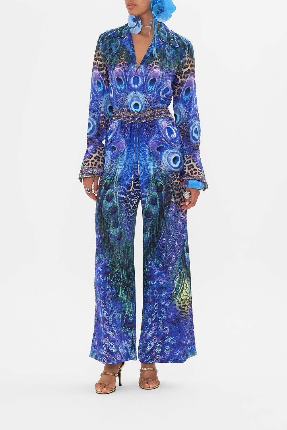 Front view of model wearing CAMILLA silk pants in Peacock Rock print