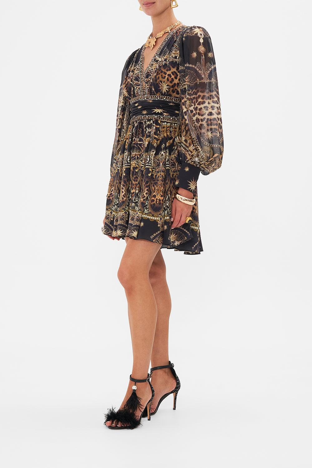 Side view of model wearing CAMILLA mini dress in Masked At Moonlight print 