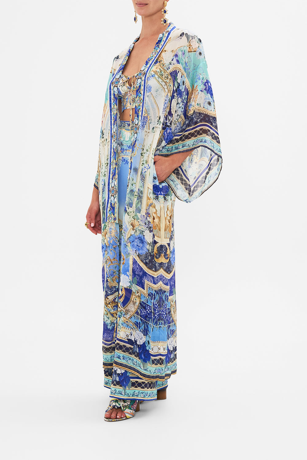 Side view of model wearing CAMILLA silk kimono layer in Views Of Vesuvius print 
