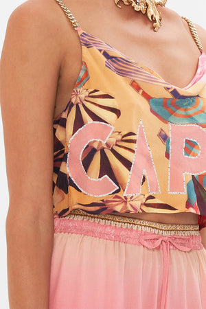 Detail view of model wearing CAMILLA silk crop cami in Capri Me print 