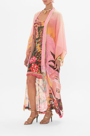 Side view of model wearing CAMILLA silk kimono in Capri Me print