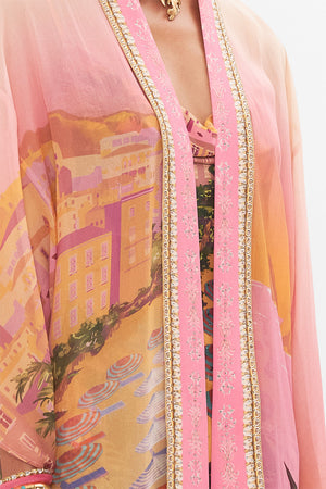 Detail view of model wearing CAMILLA silk kimono in Capri Me print