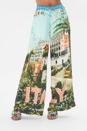 Crop view of model wearing CAMILLA silklounge pant in From Sorrento With Love print