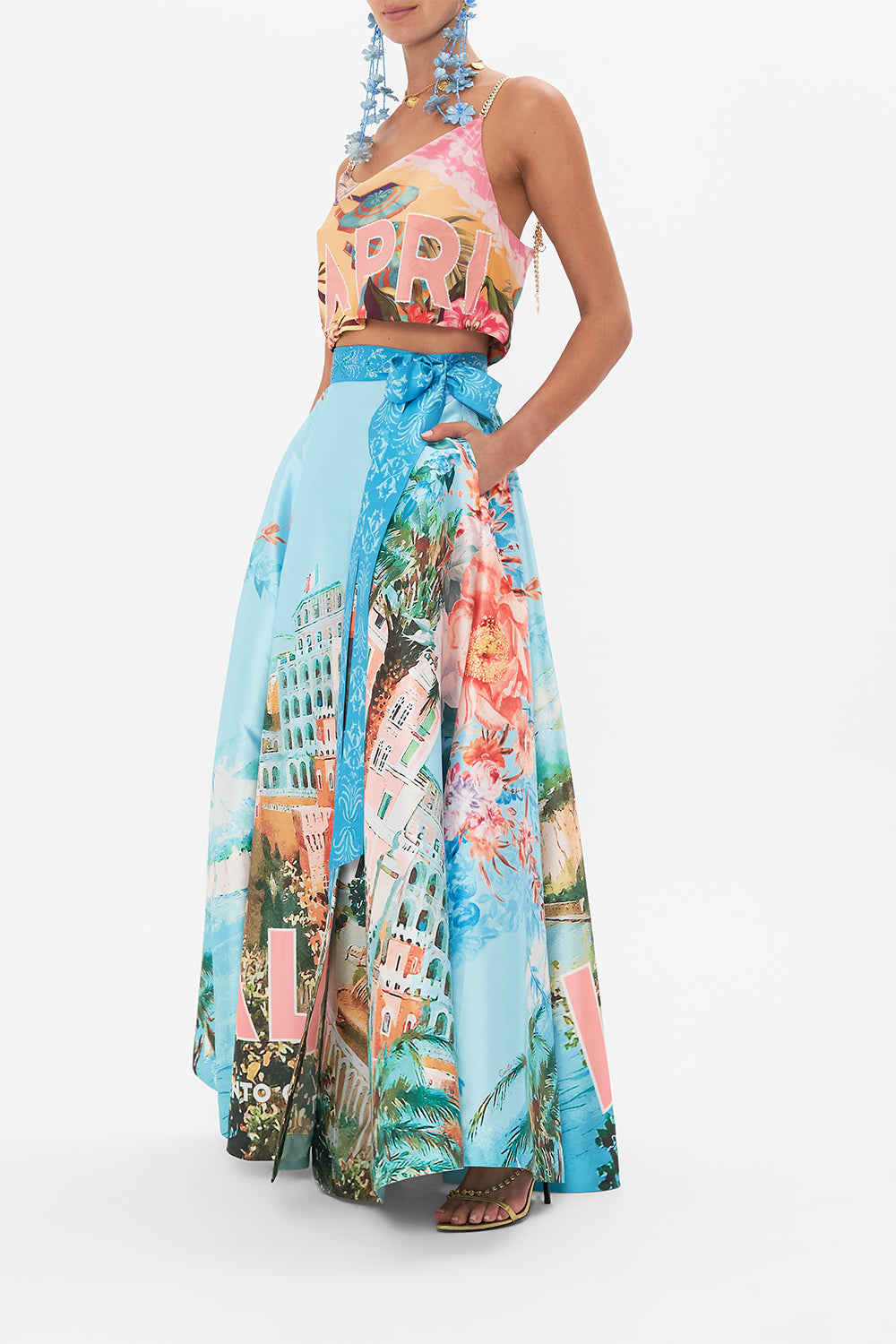 Side view of model wearing CAMILLA maxi wrap skirt in From Sorrento With Love print