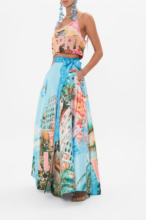 Side view of model wearing CAMILLA maxi wrap skirt in From Sorrento With Love print