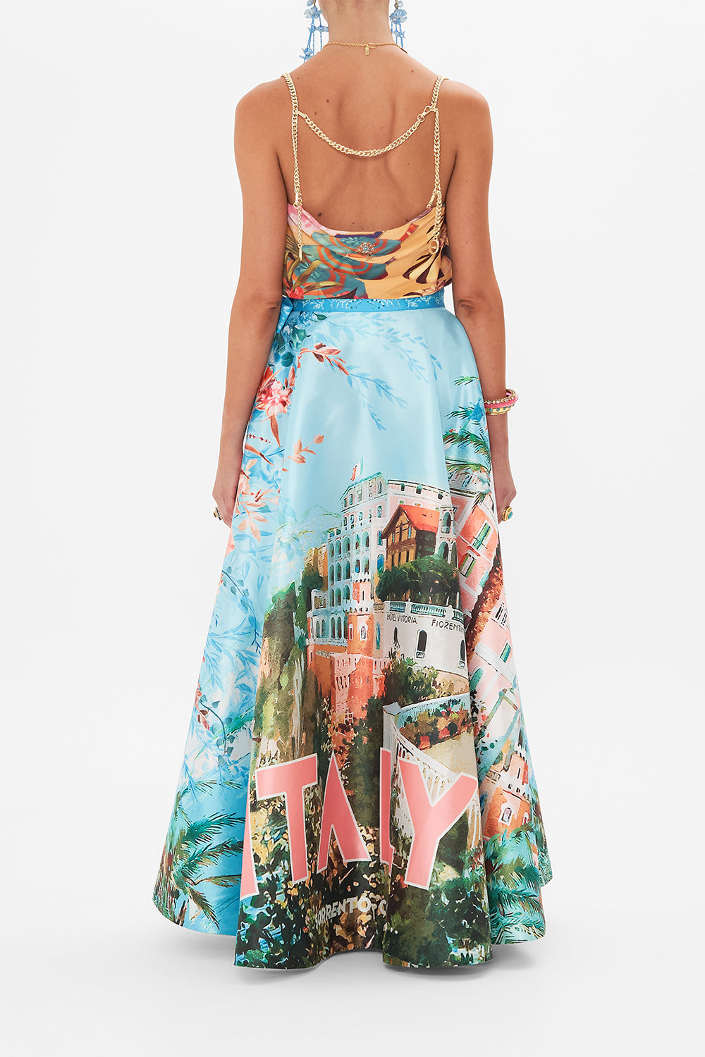 Back view of model wearing CAMILLA maxi wrap skirt in From Sorrento With Love print