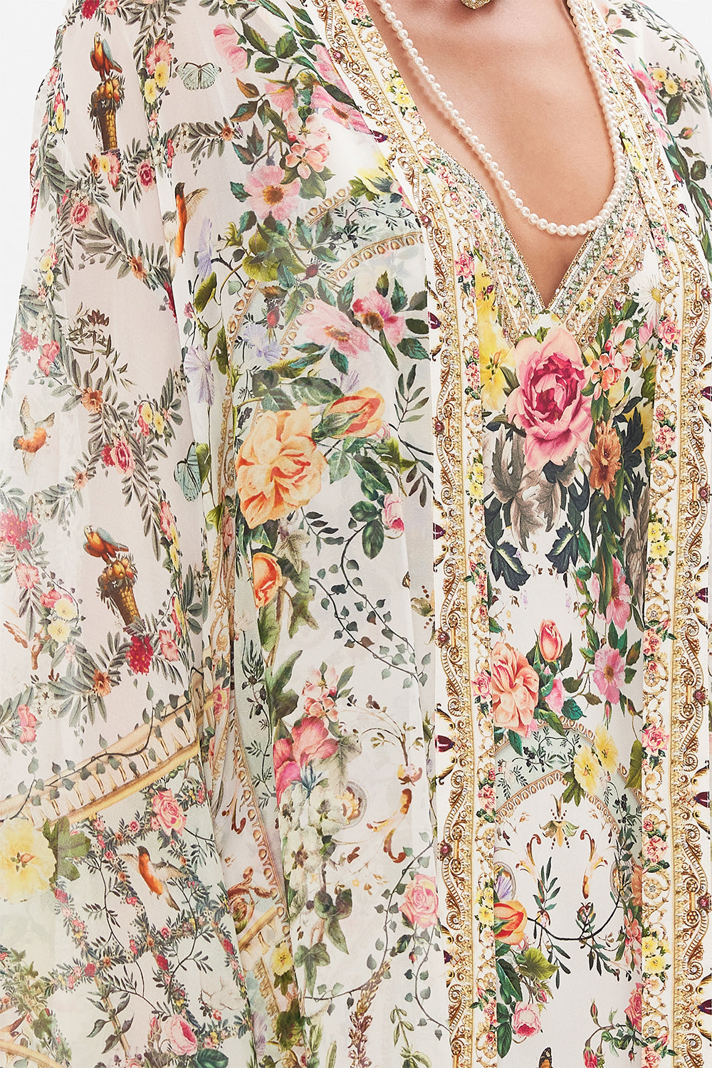 Detail view of model wearing CAMILLA silk robe in Renaissance Romance print