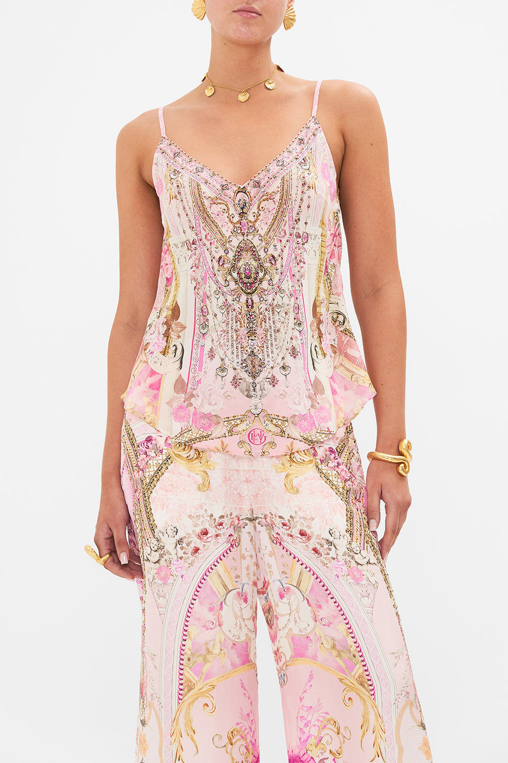 Crop view of model wearing CAMILLA silk cami in Fresco Fairytale print