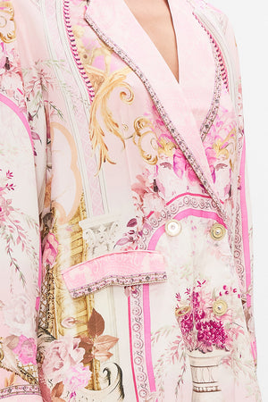 Detail view of model wearing CAMILLA silk blazer in Feeling Fresco print