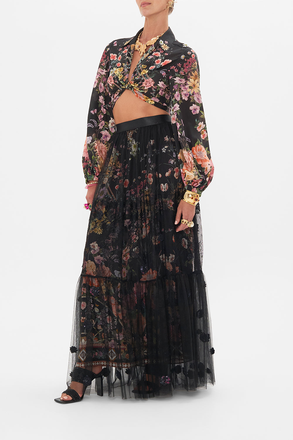 Side view of model wearing CAMILLA ruffle skirt in Letters From A Vineyard print