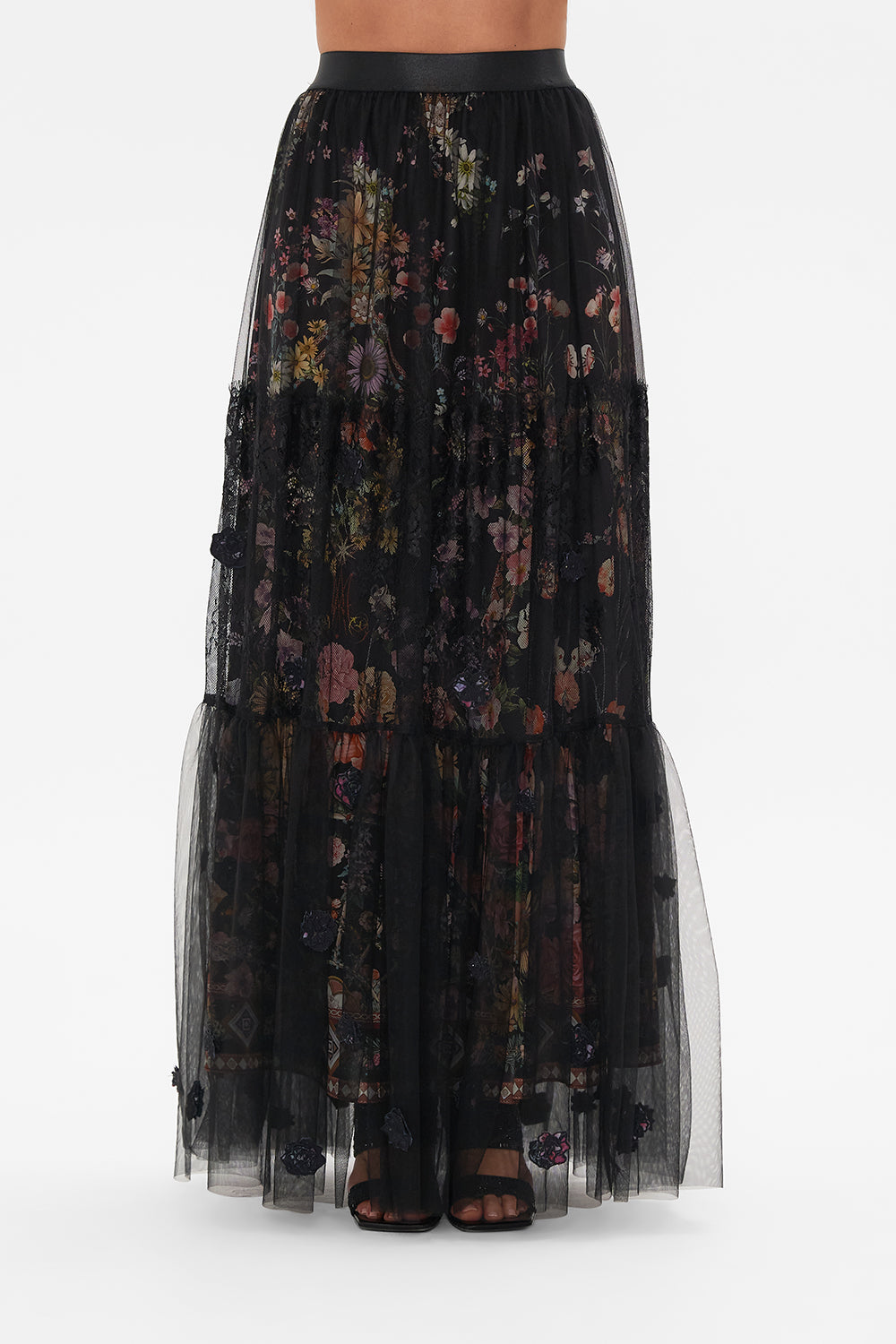 Crop view of model wearing CAMILLA ruffle skirt in Letters From A Vineyard print