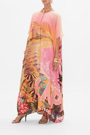 Side view of model wearing CAMILLA silk kaftan in Capri Me print